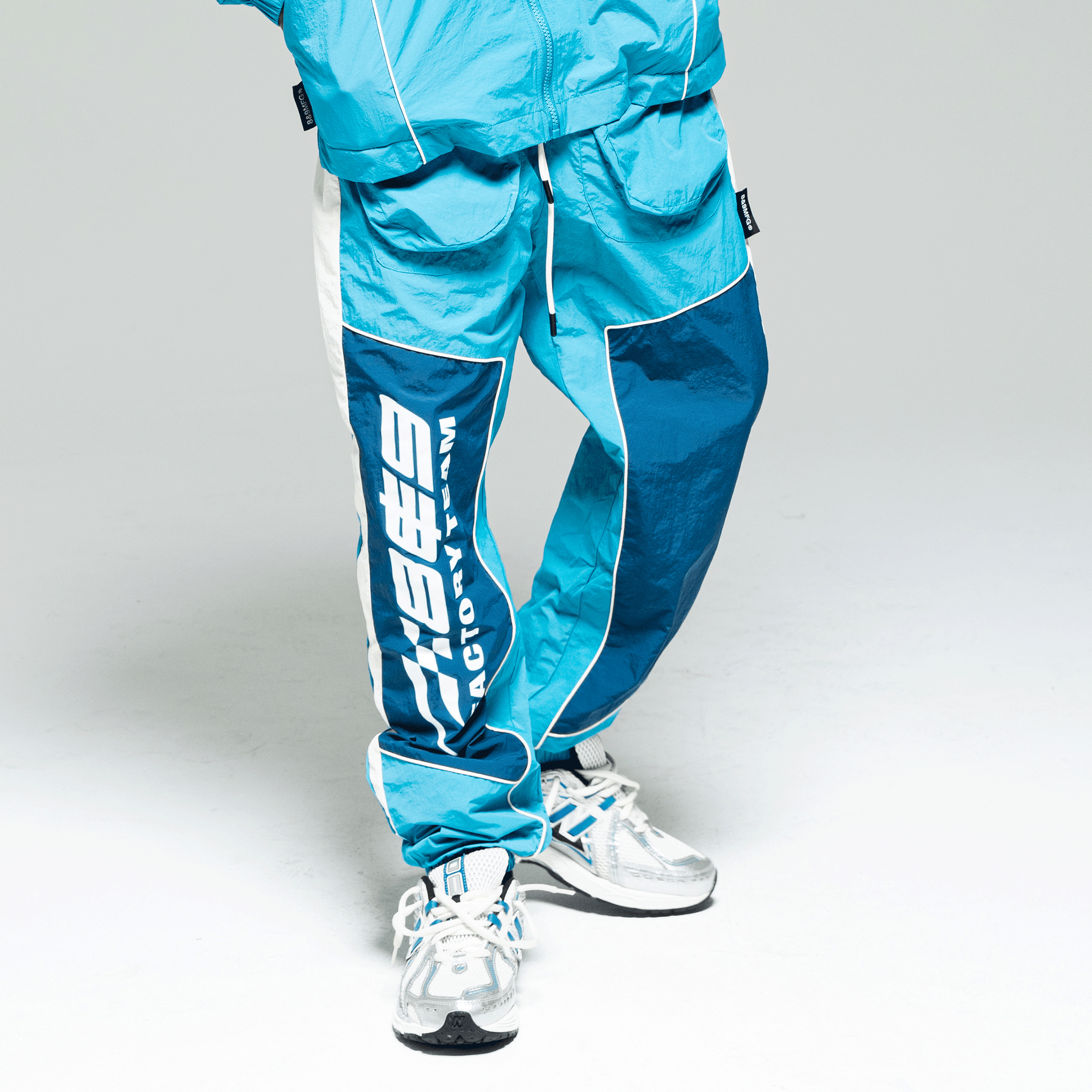 Factory Team Nylon Pant Dark Teal – 8&9 Clothing Co. Factory Team Nylon Pant Dark Teal – 8&9 Clothing Co.