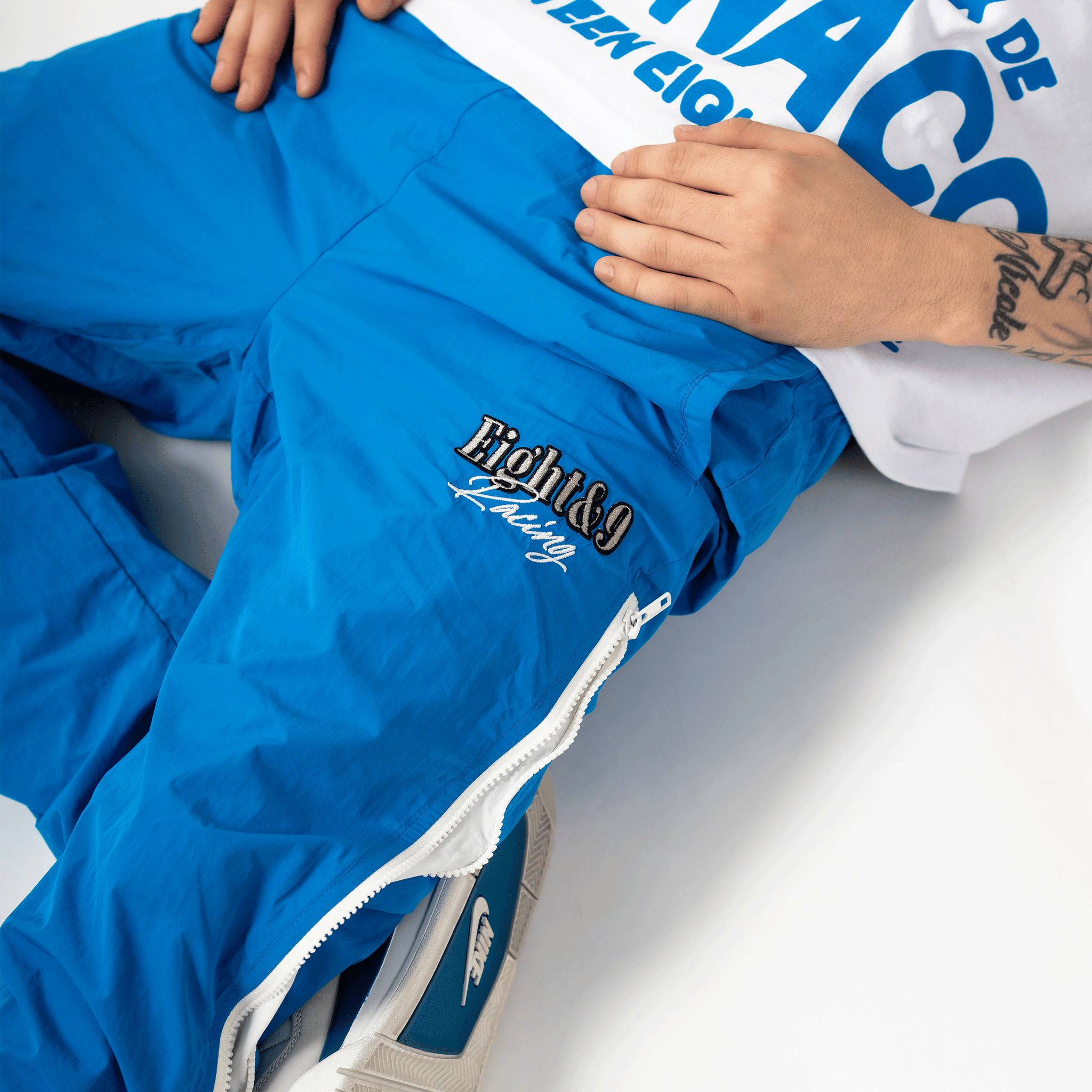 Slide Nylon Flare Zipper Pant Blue – 8&9 Clothing Co. Slide Nylon Flare Zipper Pant Blue – 8&9 Clothing Co.