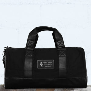Triple Black Canvas Duffel Bag
