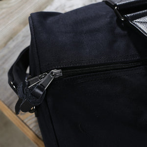 Triple Black Canvas Duffel Bag